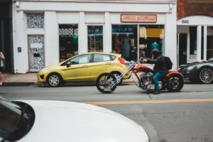 man in black jacket riding on motorcycle