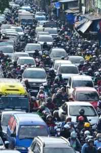 Heavy traffic congestion fills the road.
