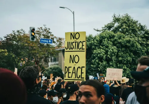 people gathering on street during daytime